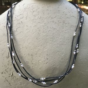 Silpada necklace, black leather, white cz and sterling silver beads, 17-18 inch